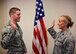 Staff Sgt. Brandon Issler takes the oath of enlistment to stay in the unit and serve again as administered by Lt. Col. Carole Lowe during the 932nd Airlift Wing drill weekend held on June 4, 2017, at Scott Air Force Base, Illinois.  They are both members of the 932nd Aerospace Medicine Squadron.  AMDS keeps the unit humming medically with physicals and blood pressure checks, just a small part of the large amount of work that occurs to keep Airmen healthy and ready to deploy in the wing. (U.S. Air Force photo by Lt. Col. Stan Paregien)