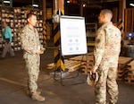DLA Distribution commanding general Army Brig. Gen. John S. Laskodi is briefed on the Navy Advanced Traceability and Control Mission Area at DLA Distribution Susquehanna, Pennsylvania’s Mechanicsburg location.  