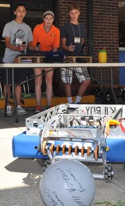 KING GEORGE. Va. (June 28, 2017) - A science, technology, engineering, and mathematics (STEM) Summer Academy junior mentor (high school student), middle, gives middle school STEM campers some pointers as they operate the team Kilroy 339 robot designed, programmed and built by local high school students. Nine junior mentors joined 17 NSWCDD scientists and engineers and 17 middle school teachers at the week-long camp to encourage middle school students to develop their teamwork and problem-solving skills in math and science.