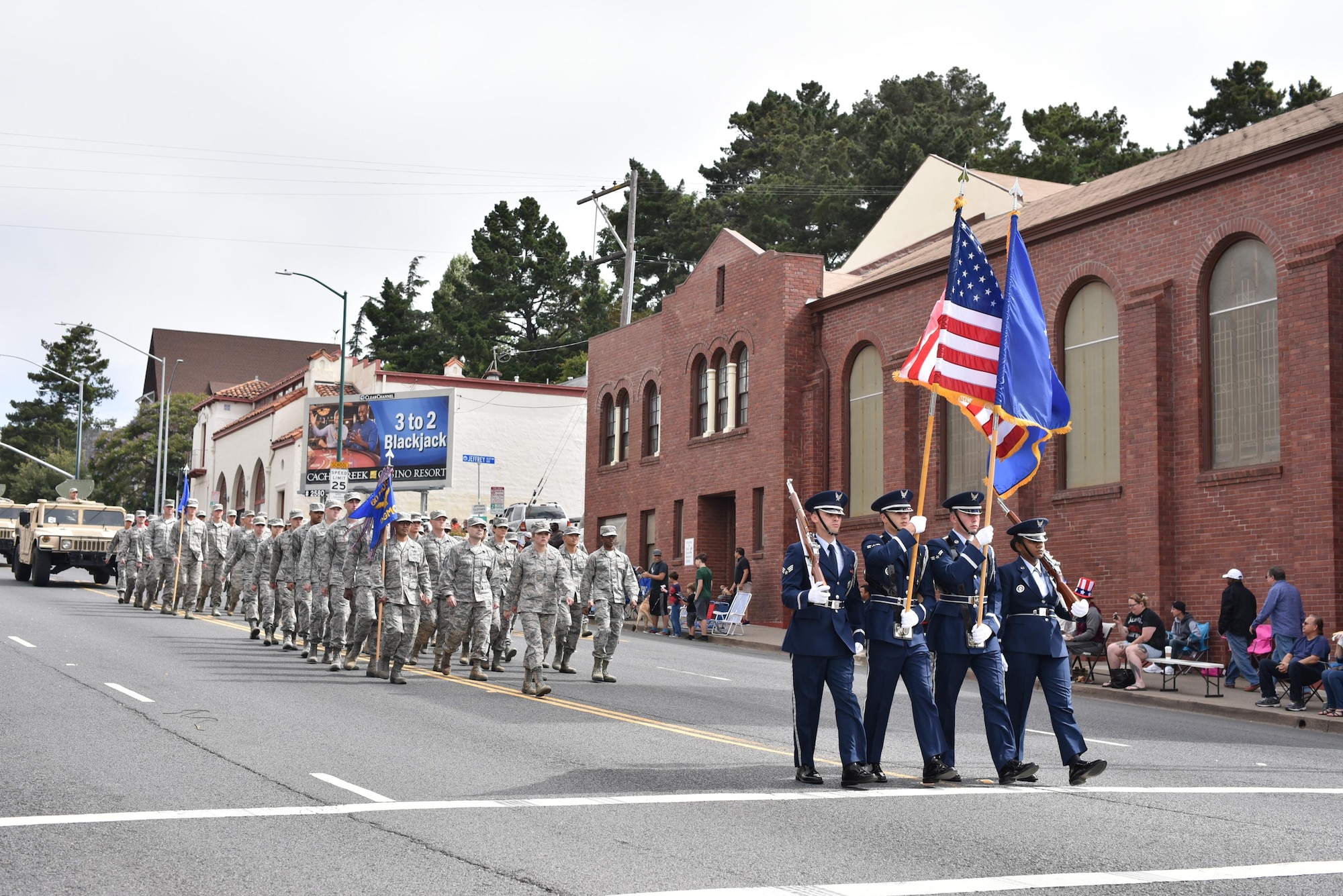 Members of the Travis Air Force Base Honor Guard march along Sonoma St. in Vallejo, Calif., during the city’s annual Independence Day Parade, July 4, 2017. About 75 Airmen from the 60th Medical Group and 821st Contingency Response Squadron also participated in the parade, with residents cheering them along a 1.5-mile path through the city. (U.S. Air Force photo by Ken Wright)