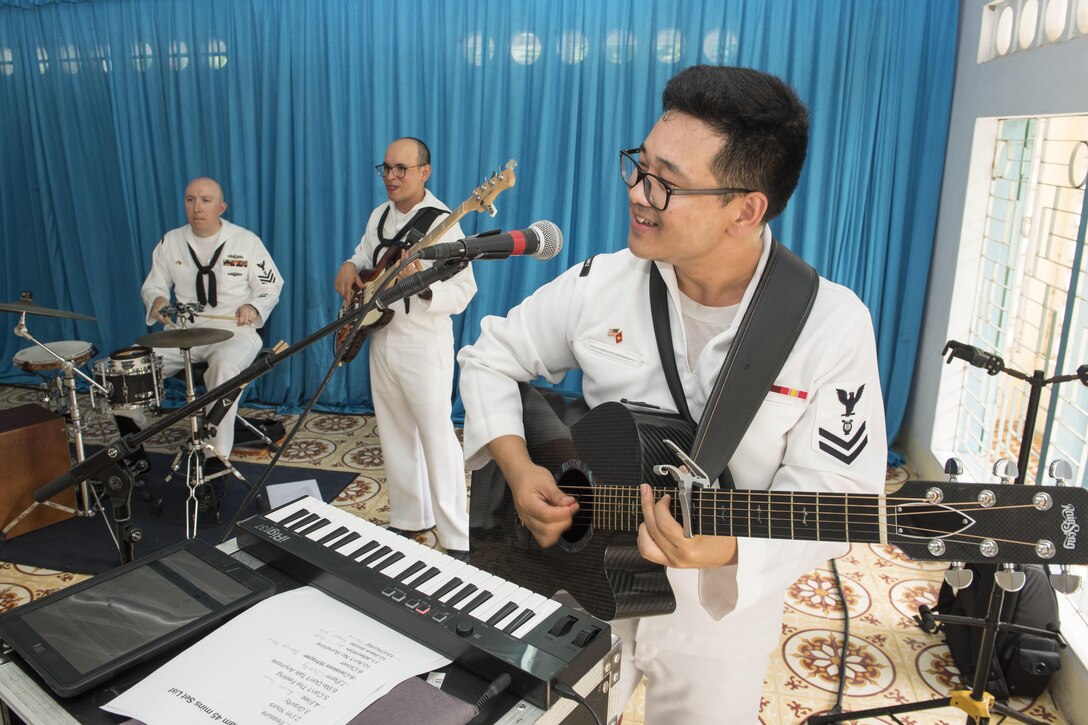 The U.S. 7th Fleet Band's Orient Express performs at Khanh Hoa Center for Social Protection during Naval Engagement Activity Vietnam 2017 in Nha Trang, Vietnam, July 6, 2017. Navy photo by Petty Officer 2nd Class Joshua Fulton