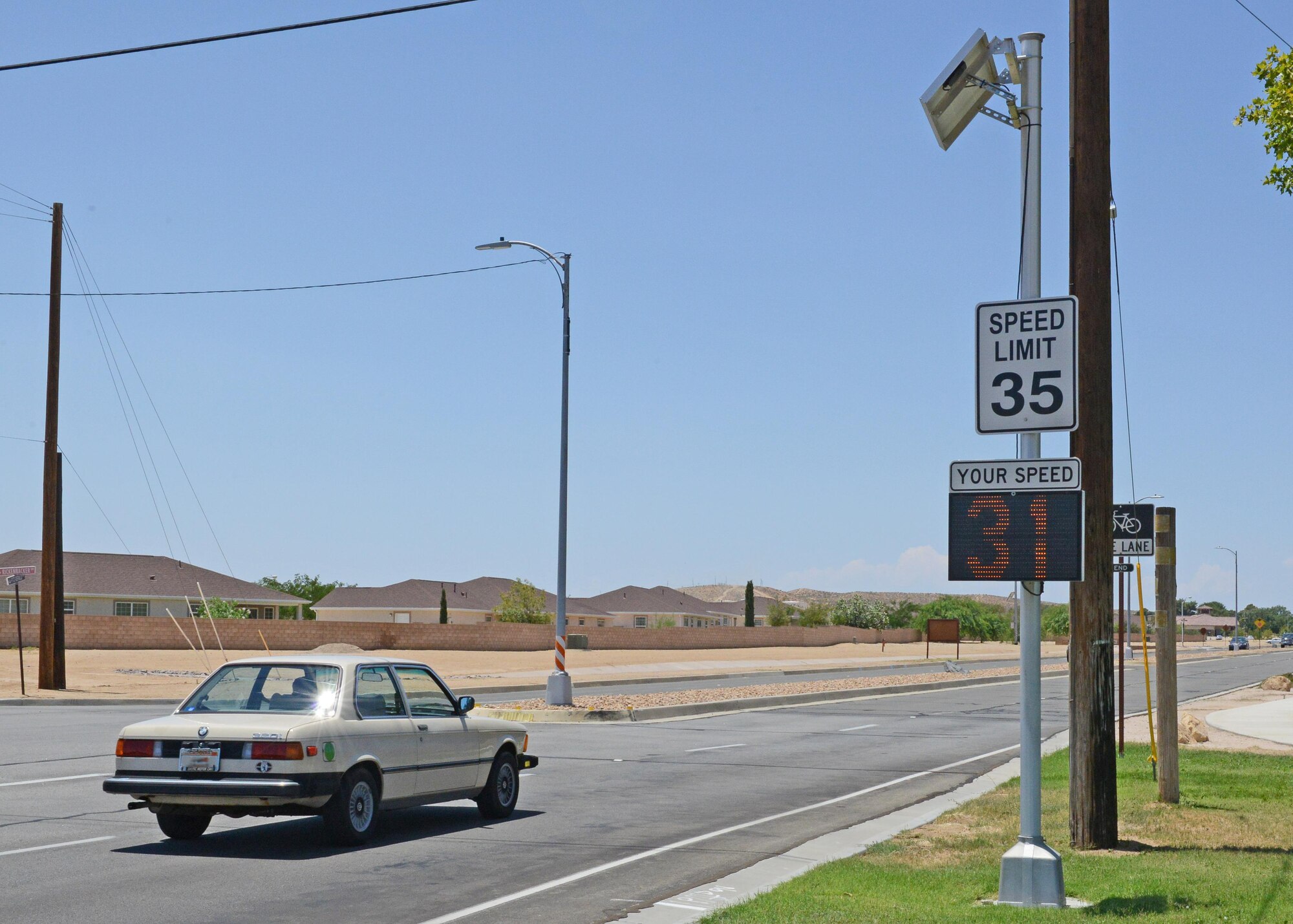 Signs like this one on Fitz-Gerald Blvd. serve as a reminder to motorists to maintain the proper speed limit. (U.S. Air Force photo by Kenji Thuloweit)       