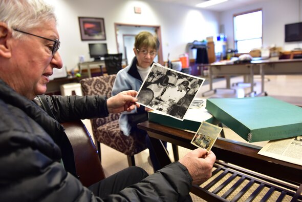 Retired Capt. John Lavrich and his wife Janet look through a box of their wedding photographs at the Niagara Falls Air Reserve Station, Niagara Falls, N.Y. on April 24, 2017. The couple were married on base 50 years ago and returned to commemorate the event. (U.S. Air Force photograph by Staff Sgt. Richard Mekkri) 