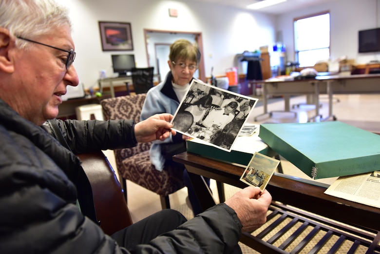 Retired Capt. John Lavrich and his wife Janet look through a box of their wedding photographs at the Niagara Falls Air Reserve Station, Niagara Falls, N.Y. on April 24, 2017. The couple were married on base 50 years ago and returned to commemorate the event. (U.S. Air Force photograph by Staff Sgt. Richard Mekkri) 