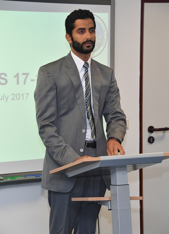 Oman Air Force 1st Lt. Mohammed Murad Kamal Han Murad Al-Balushi, a security officer with the Royal Air Force of Oman, tells his fellow graduates that the world has become “smaller, closer and easier” for them during the graduation ceremony for the English Language Enhancement Course at the George C. Marshall European Center for Security Studies July 5. (Marshall Center photo by Karl-Heinz Wedhorn)