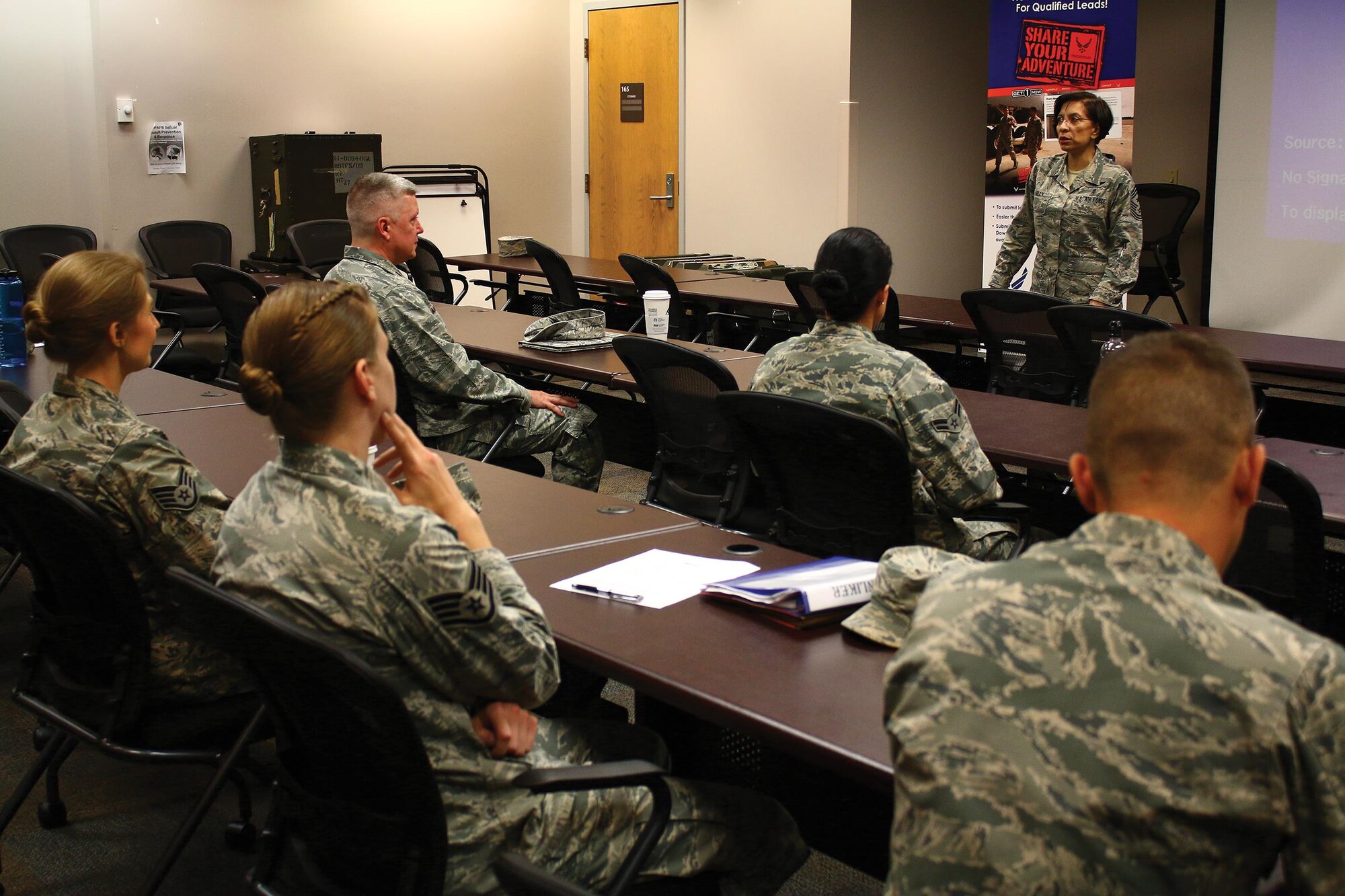 Chief Master Sgt. Ericka Kelly, Command Chief Master Sergeant, Air Force Reserve Command, speaks to newcomers as part of her visit to the 445th Airlift Wing June 2-4, 2017. During her time at the wing, Chief Kelly observed a C-17 Globemaster III engine change, had lunch with Airmen at the Pitsenbarger Dining Facility, met with the first sergeants, participated in a commander’s call with Airmen and toured the facilities of the aerospace medicine squadron, aeromedical evacuation squadron Airmen and the mission support group. (U.S. Air Force photo/Tech. Sgt. Patrick O’Reilly)