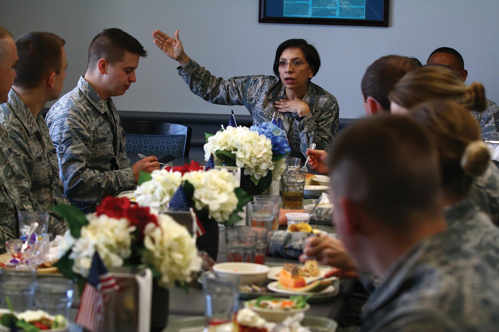 Chief Master Sgt. Ericka Kelly, Command Chief Master Sergeant, Air Force Reserve Command, talks with Airmen from the 445th Airlift Wing during lunch at the Pitsenbarger Dining Facility as part of her visit to the wing June 2-4, 2017. During her time at the wing, Chief Kelly observed a C-17 Globemaster III engine change, spoke to newcomers, met with the first sergeants, participated in a commander’s call with Airmen and toured the facilities of the aerospace medicine squadron, aeromedical evacuation squadron Airmen and the mission support group. (U.S. Air Force photo/Tech. Sgt. Patrick O’Reilly)