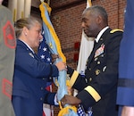 Defense Logistics Agency Director Army Lt. Gen. Darrell Williams passes the DLA flag to Air Force Brig. Gen. Linda Hurry as she assumes command of DLA Aviation June 28, 2017 during a ceremony on Defense Supply Center Richmond, Virginia.  