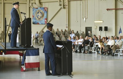 Col. Robert Lyman, 628th Air Base Wing and Joint Base Charleston outgoing commander, bids farewell to his joint team during a change of command ceremony at Nose Dock 2 here, July 6, 2017. Col. Jeffrey Nelson took command from Lyman during the ceremony. Lyman’s tenure began in July 2015. He is now scheduled for an assignment to Joint Special Operations Command, Fort Bragg, N.C., where he will be the director of communications.