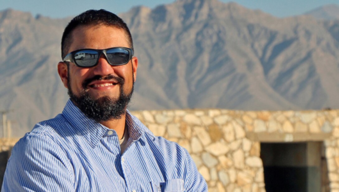 Jason Montano, an industrial workload specialist at Robins Air Force Base, Ga., is currently serving a one-year tour at Bagram Airfield, Afghanistan. At any one time, there are about 150 Air Force civilians deployed at various locations around the world. (U.S. Air Force Photo/Jathzed Fabara)