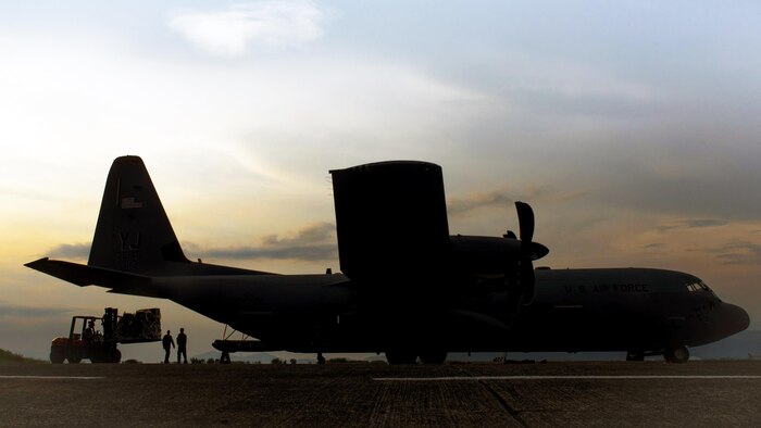 Yokota Air Base, Japan - Airmen assigned to the 374th Airlift Wing at Yokota Air Base, Japan, load cargo unto a C-130J Super Hercules during Yokota’s first C-130J operational mission, June 30, 2017, at Manila, Philippines. The mission 