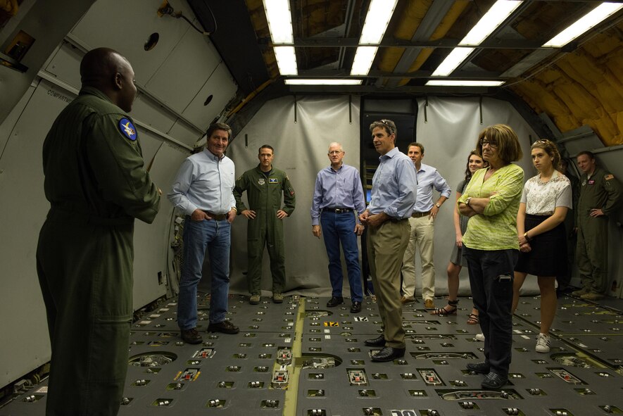 Tech. Sgt. Kenneth Cook (left), 6th Aerial Refueling Squadron boom operator, gives a tour of the KC-10 Extender to a congressional delegation visiting Travis Air Force Base, Calif., June 30, 2017. The KC-10 is an Air Mobility Command advanced tanker and cargo aircraft designed to provide increased global mobility for U.S. armed forces. (U.S. Air Force photo by Master Sgt. Joseph Swafford)
