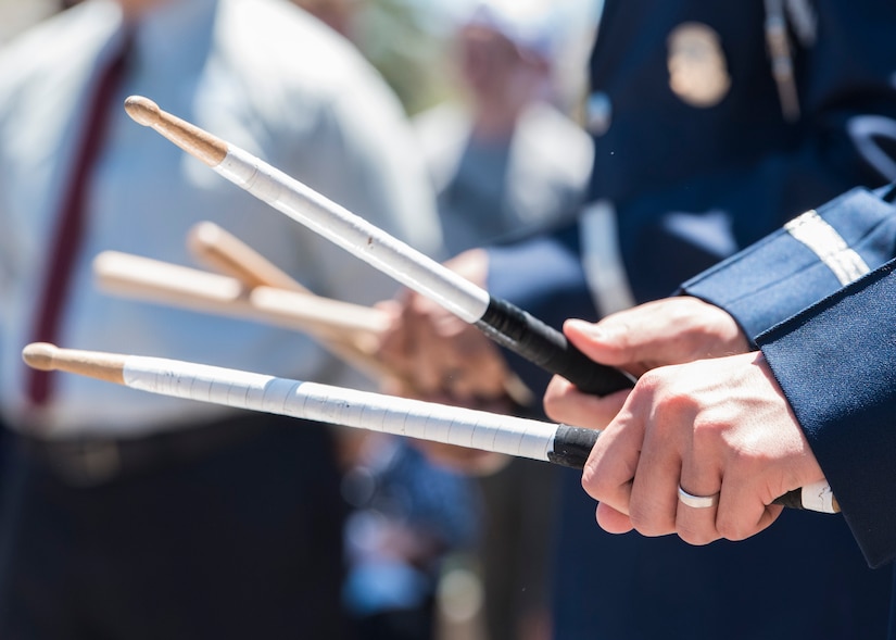 Airman 1st Class Mason Yu, U.S. Air Force Honor Guard drummer, keeps time with drumsticks during a performance at Disney’s California Adventure Park in Anaheim, Calif., June 28, 2017. In order to perform across the country with collective accuracy, the team practiced the routine approximately six times together before leaving Joint Base Anacostia-Bolling, District of Columbia, and prior to the start of each performance day on the trip. (U.S. Air Force photo by Senior Airman Jordyn Fetter)