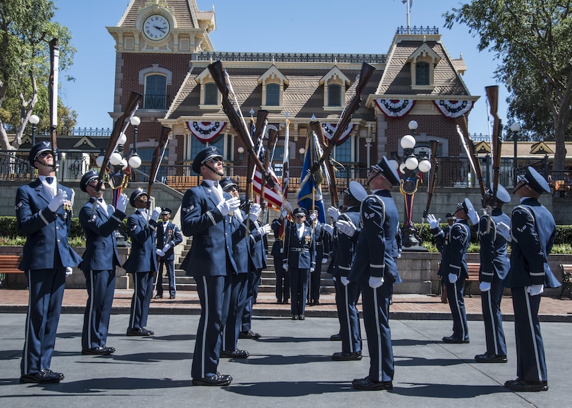 The U.S. Air Force Honor Guard Drill Team performs at Disneyland in Anaheim, Calif., June 28, 2017. The “Ambassadors in Blue” demonstrated drill routines during their recent tour of Southern California where they also performed at Sea World, Disney’s California Adventure Park, and Mission Beach from June 27 to July 1. (U.S. Air Force photo by Senior Airman Jordyn Fetter)