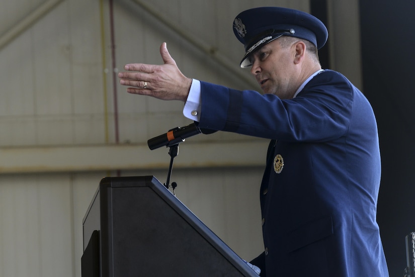 Maj. Gen. Christopher Bence, U.S. Air Force Expeditionary Center commander, speaks to members of Joint Base Charleston, during the 628th Air Base Wing and Joint Base Charleston change of command ceremony at Nose Dock 2 here, July 6. Col. Jeffrey Nelson replaced Col. Robert Lyman as the commander.