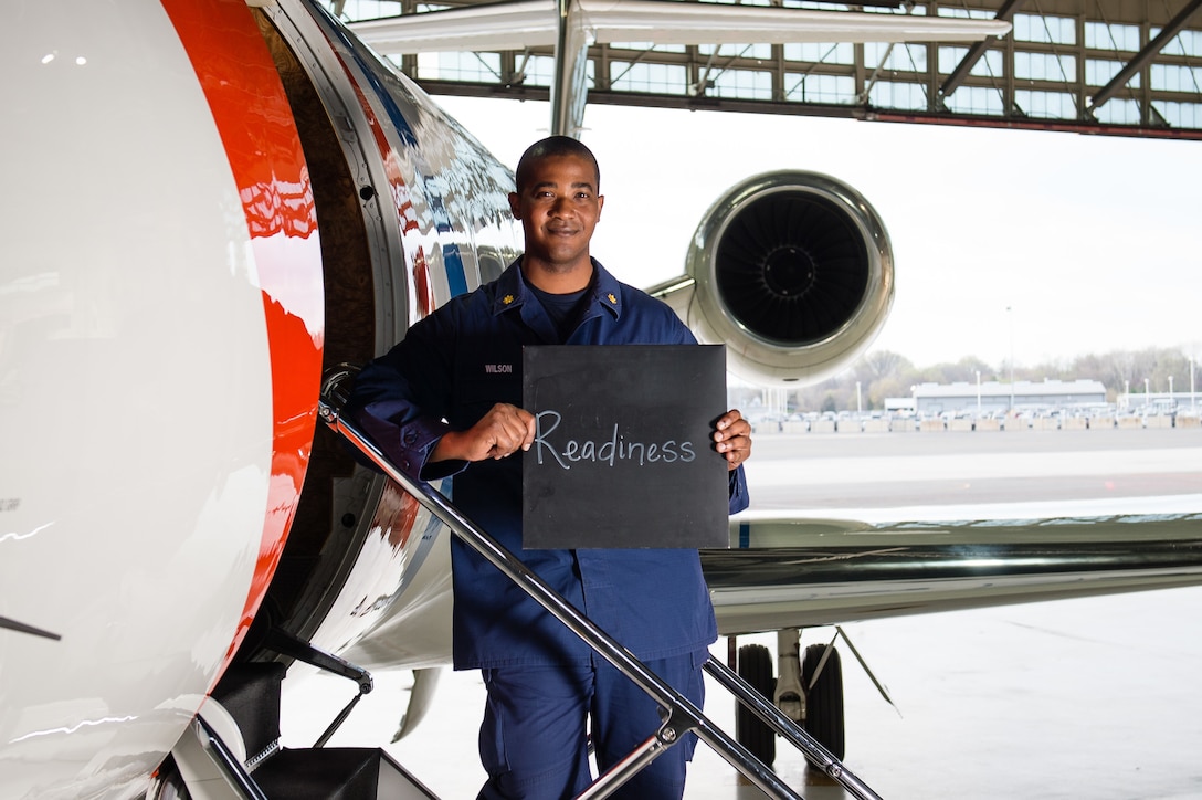 1. What is your name and what do you do in the Coast Guard?
"I am Eric Wilson. I am the Chief Pilot and Operations Officer at Coast Guard Air Station Washington. Air Station Washington provides global on-demand executive transport service for the Secretary of Homeland Security, the Commandant of the Coast Guard and other senior service leaders. The unit currently has two Gulfstream 5 aircrafts."

2. Describe diversity in a word or two and explain what it means to you.
"Diversity of thought, diversity of experience, diversity of background all increase our services dynamic capabilities to execute our many missions. Therefore, diversity is not just a buzz word or project initiative; it is about readiness."

3. How has your experience and background prepared you to be effective at
your job?
"I’ve had a wealth of great opportunities in the Coast Guard. I served as a Deck Watch Officer aboard CGC WILLOW, a pilot in the HU-25, HC-144 and C37 aircraft.  I’ve been able to experience a diverse array of operational Coast Guard missions.  Every day is a unique challenge and new opportunity to learn."

4. Tell me a little bit about your life outside of work.
"Outside of work, I am working on a Master's degree in Organizational Leadership.  When I'm not writing essays, I’m spending time with my wife and kids."

U.S. Coast Guard photo by Auxiliarist David Lau