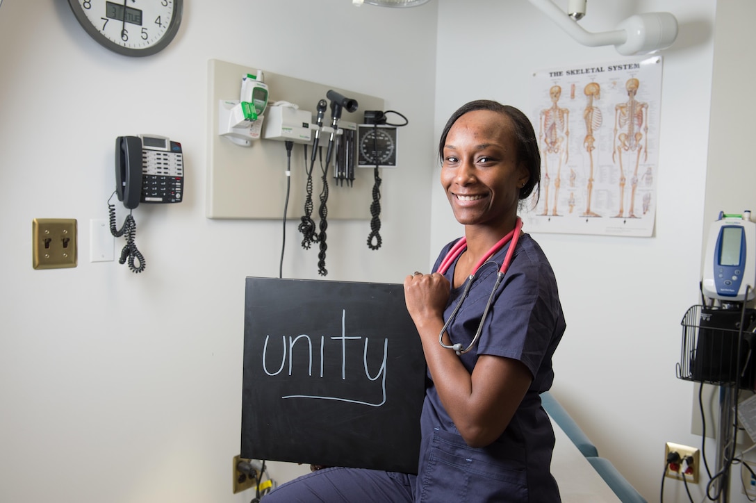 1. What is your name and what do you do in the Coast Guard?
"My name is Iris Pennypacker and I’m a Health Services Technician Coast Guard at Air Station Atlantic City. I am responsible for maintaining the health and readiness for more than 200 members at this unit and surrounding units."

2. Describe diversity in a word or two and explain what it means to you.
"I chose the word UNITY because even though we all come from different backgrounds here in the Coast Guard, we all come together to get our jobs done. Maybe that's why they call our billets a unit."

3. How has your experience and background prepared you to be effective at
your job?
"Growing up in a large and loving family really prepared me for my job in many ways. First, there is the age difference between myself and my siblings whom are older. I had to be able to fit in and really learn group dynamics at an early age. Second, with my sister being biracial, I was exposed early on that family isn't as much about race as it is about love and respect." 

4. Tell me a little bit about your life outside of work.
"Outside of work I am a wife and a mother of three. I am currently taking an EMT course to help me advance in my career. I like to stay active so when I'm not chasing around my youngest son age 3, I take a ballet class every week. I also love photography! If I'm not taking pictures of my children, I'm taking pictures of the beautiful things that nature has to offer."

U.S. Coast Guard photo by Auxiliarist David Lau