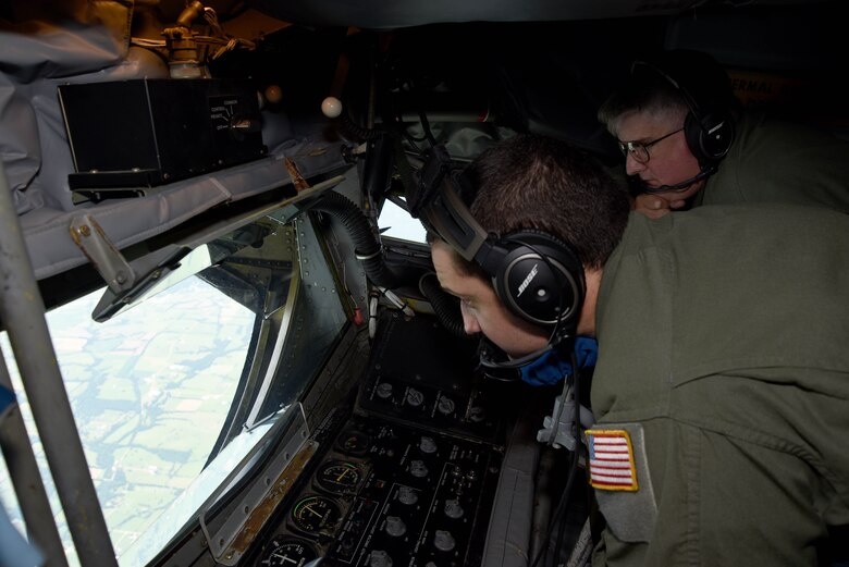 Col. Albert Miller, 22nd Air Refueling Wing commander, observes Senior Airman Andrew Mays, 350th Air Refueling Squadron boom operator, refuel an A-10 Thunderbolt II, June 30, 2017, while flying over Missouri. Air refueling is vital to Air Force operations to allow aircraft to efficiently complete the mission. (U.S. Air Force photo/Airman 1st Class Alan Ricker)