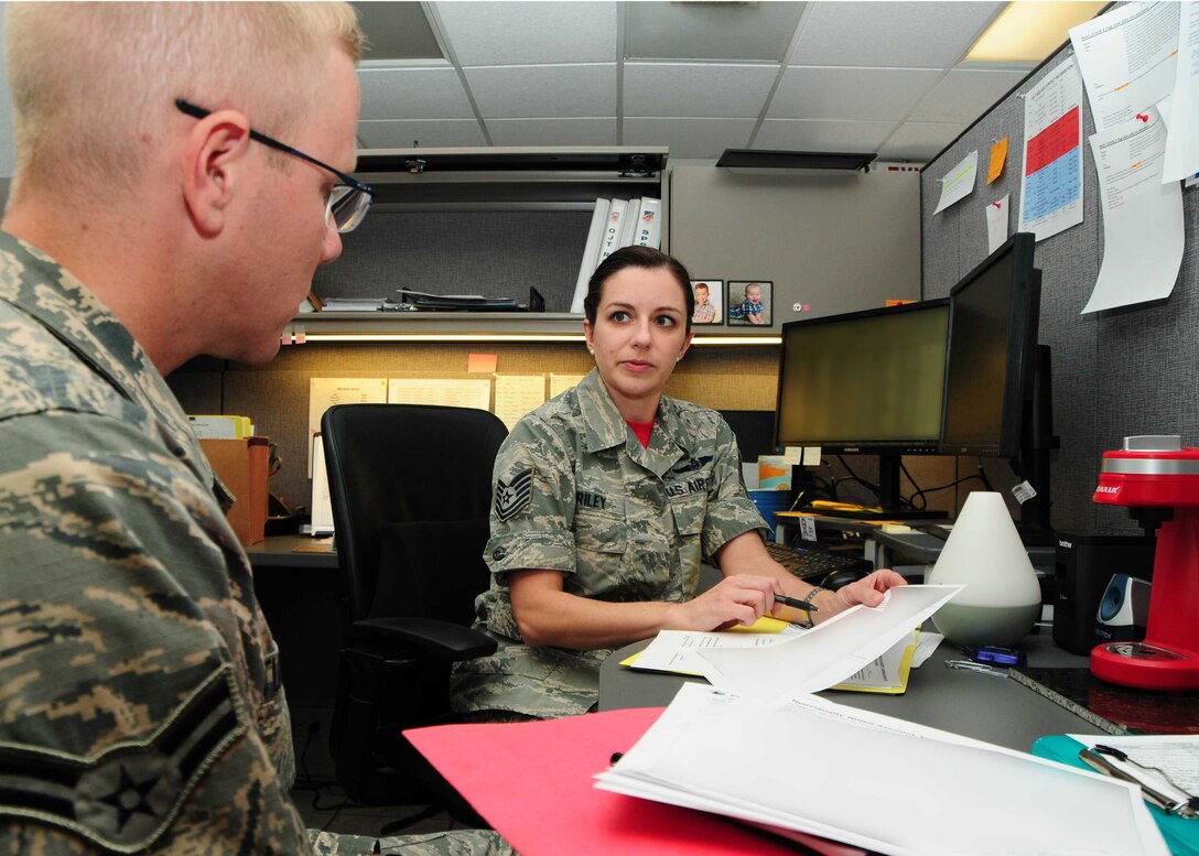 Tech. Sgt. Stacie Riley, 924th Fighter Squadron unit training manager, conducts an in-processing briefing for a new member to the unit at Davis-Monthan Air Force Base, Ariz. on June 4. Riley is one of two Airmen who is responsible for ensuring all of the enlisted personnel assigned to the unit are fully qualified to complete their mission at a moment’s notice. (U.S. Air Force photo by Tech. Sgt. Courtney Richardson)