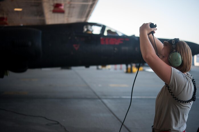 Airman 1st Class Dedrie Flowers, 9th Air Maintenance Squadron crew chief, gives the signal to apply engine start air to the U-2 Dragon Lady at Beale Air Force Base, Calif., June 20, 2017. The U-2 is a single-seat, single-engine, high-altitude/near space reconnaissance and surveillance aircraft providing signals, imagery, and electronic measurements and signature intelligence. (U.S. Air Force photo by Airman 1st Class Justin Parsons/released)



