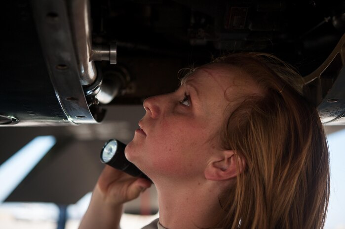 Airman 1st Class Dedrie Flowers, 9th Air Maintenance Squadron crew chief, checks a section of a U-2 Dragon Lady for any mechanical defects at Beale Air Force Base, Calif., June 20, 2017. Crew chiefs are responsible for performing detailed inspections to the U2 prior to and after a flight to ensure that it is in serviceable condition.
