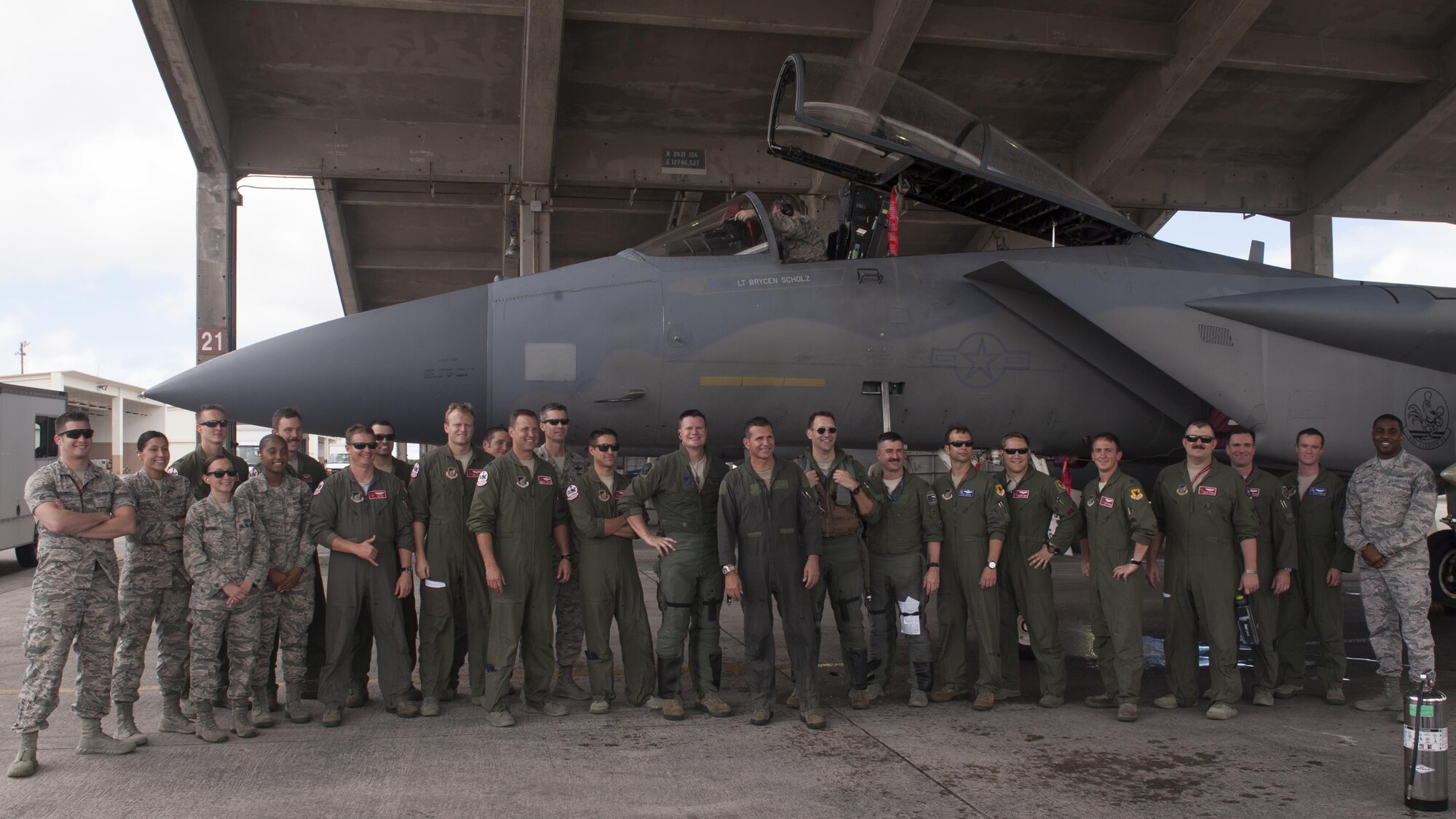 U.S. Air Force Brig. Gen. Barry Cornish, 18th Wing commander, and members from Team Kadena pose for a group photo June 29, 2017, at Kadena Air Base, Japan. Cornish conducted his final flight as the 18th WG commander and celebrated the moment with his family and close friends of Team Kadena. (U.S. Air Force photo/ Airman 1st Class Greg Erwin)