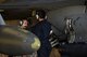 Cadet 2nd Class Garrett Amy, back, shadows Airman 1st Class Joshua Leemon, front, 480th Aircraft Maintenance Unit crew chief, while prepping an F-16 Fighting Falcon to taxi at Spangdahlem Air Base, Germany, July 5, 2017. The cadets visited several different squadrons around base to help give them a better understanding of the operational Air Force and help them decide on career paths available to them. (U.S. Air Force photo by Staff Sgt. Jonathan Snyder)