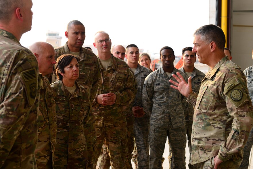 U.S. Army Lt. Gen. Stephen Townsend, Combined Joint Task Force – Operation Inherent Resolve commanding general, speaks with Airmen during his visit to the 407th Air Expeditionary Group in Southwest Asia July 6, 2017. The general stopped at several work centers meeting with Airmen and Marines, discussing the various missions they perform at the 407th AEG and the Special Marine Air Ground Task Force. (U.S. Air Force photo by Tech Sgt. Andy M. Kin)