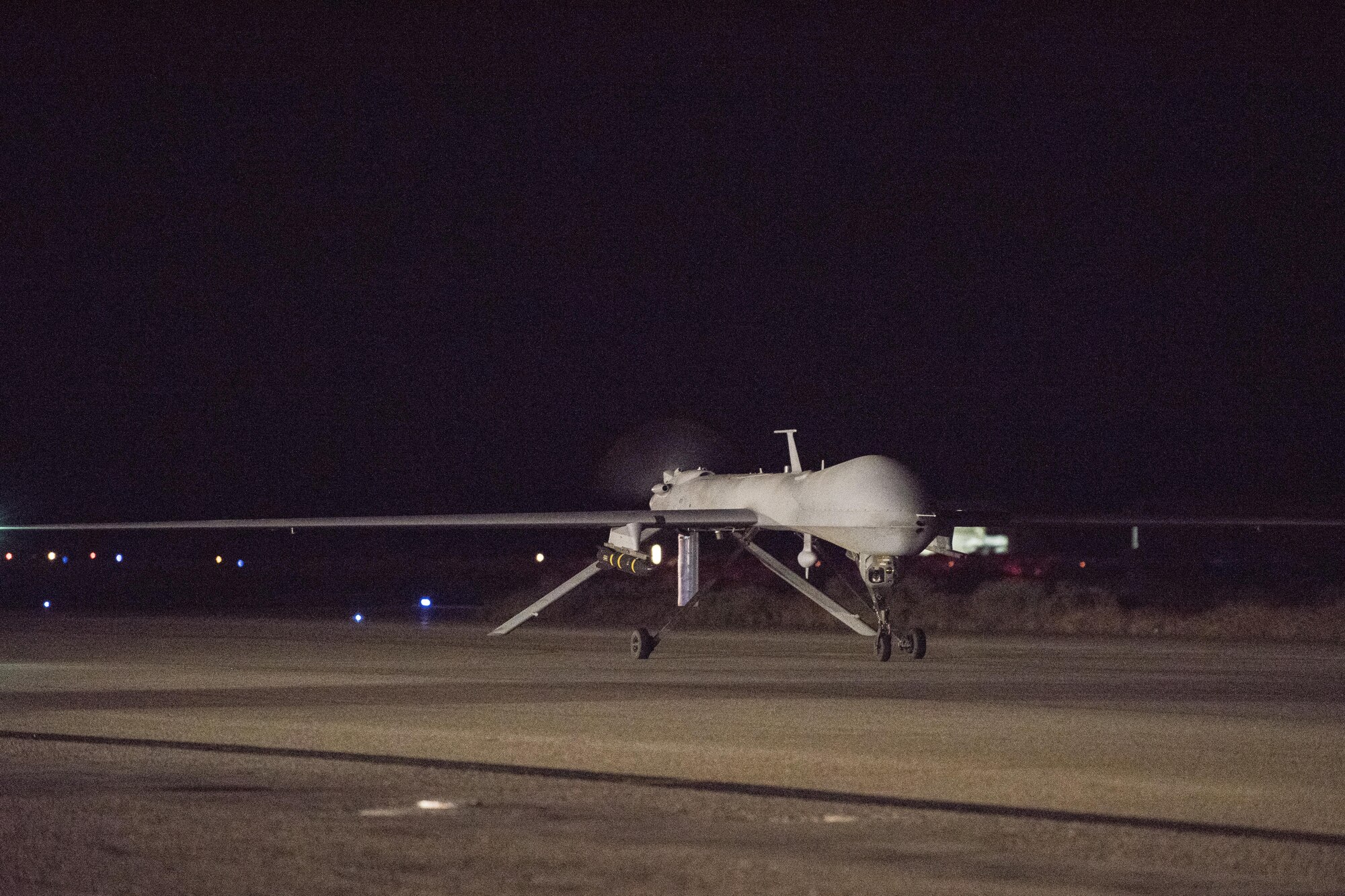 An MQ-1B Predator taxies in after completing a combat mission July 1, 2017, in Southwest Asia. This marked the last combat mission for the MQ-1Bs under the command of the 361st Expeditionary Attack Squadron. (U.S. Air Force photo/Senior Airman Damon Kasberg)