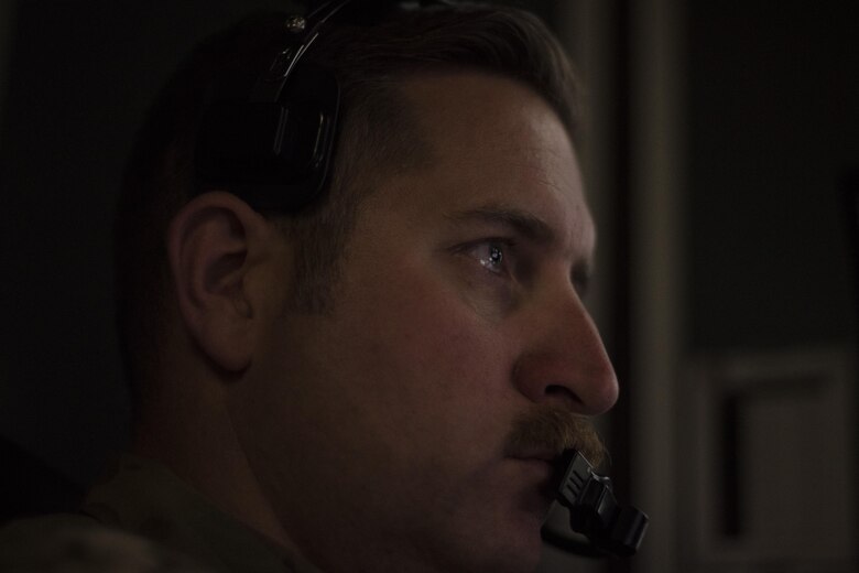 Lt. Col. Douglas, 361st Expeditionary Attack Squadron commander, pilots an MQ-1B Predator, July 2, 2017, in Southwest Asia. The day prior, the MQ-1B completed its last combat mission while assigned to the 361st EATKS. (U.S. Air Force photo/Senior Airman Damon Kasberg)