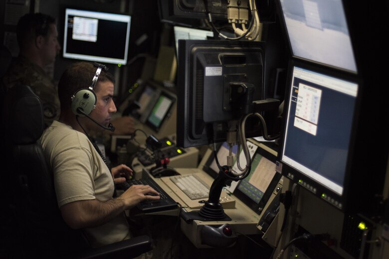 Staff Sgt. Rafael, 361st Expeditionary Attack Squadron sensor operator, helps control an MQ-1B Predator, July 2, 2017, in Southwest Asia. The day prior, the MQ-1B completed its last combat mission while assigned to the 361st EATKS.  (U.S. Air Force photo/Senior Airman Damon Kasberg)