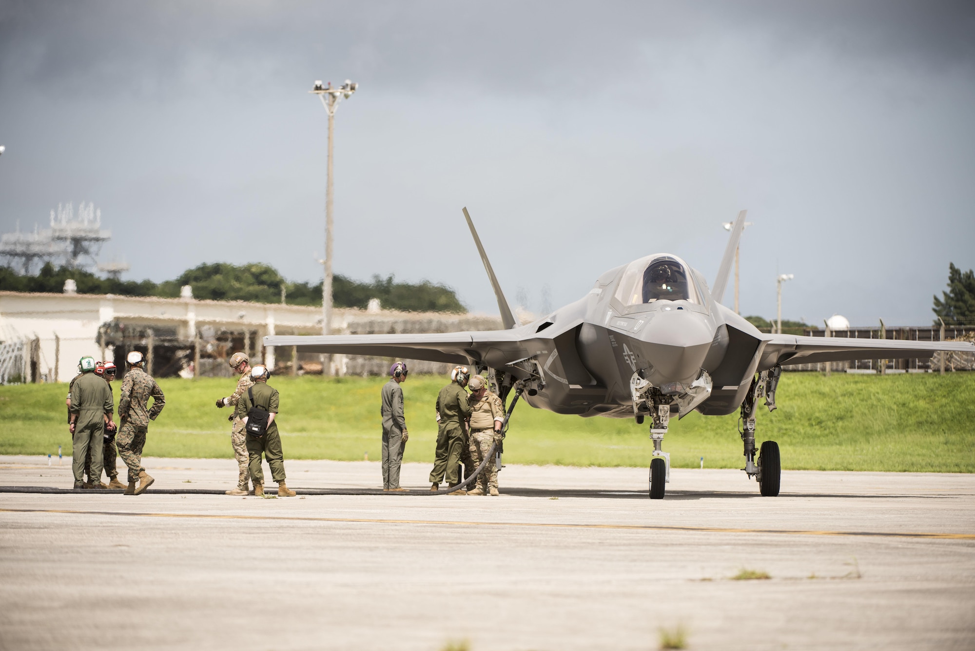 U.S. Air Force 353rd Special Operations Group, 18th Logistics Readiness Squadron, and Marine Wing Support Squadron 172 refueling teams refuel a Marine Fighter Attack Squadron 121 F-35B Lightning II during a forward area refueling point joint training exercise June 27, 2017, at Kadena Air Base, Japan. FARP enables the Air Force to perform a wide range of missions across multiple domains and brings the most advanced technologies and capabilities of the U.S. military to the region by enabling aircraft to land, refuel and take off again.  (U.S. Air Force photo by Senior Airman Omari Bernard)