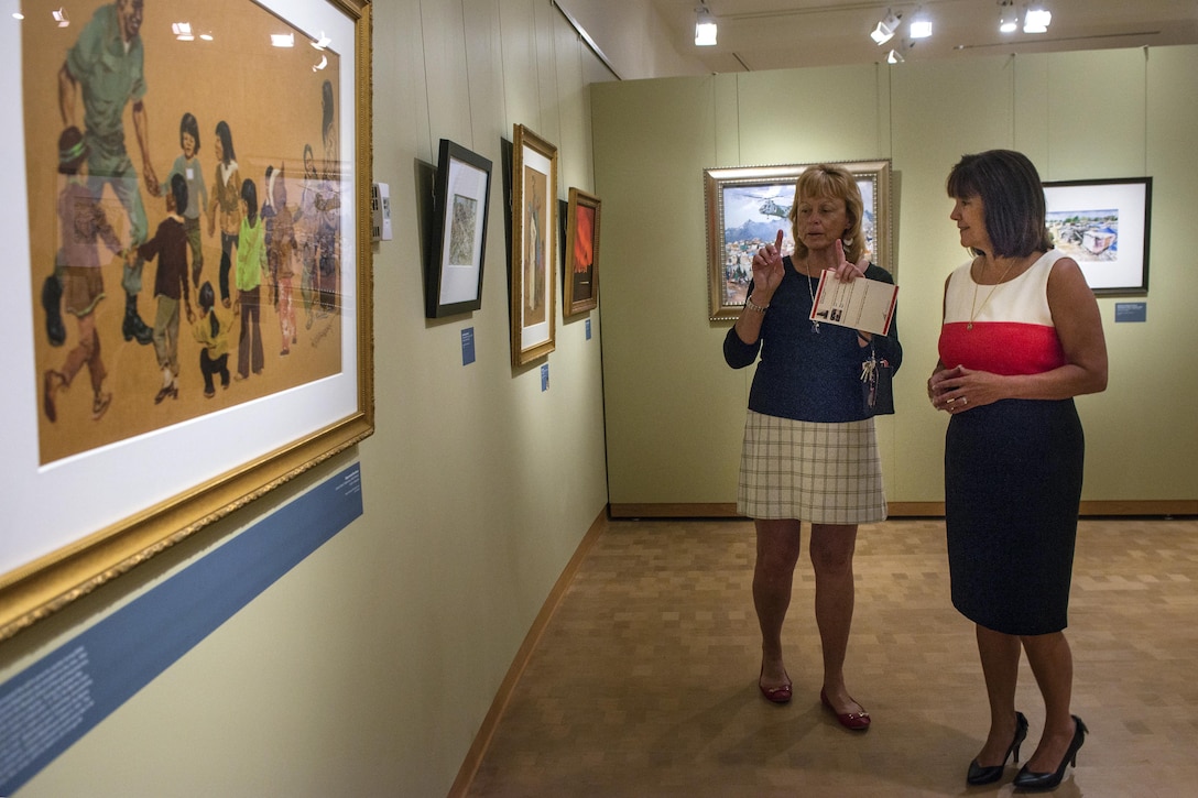 Karen Pence, right, the wife of Vice President Mike Pence, tours the Combat Art Gallery at the National Museum of the Marine Corps with Lin Ezell, the museum’s director, in Triangle, Va., July 6, 2017. The gallery’s first exhibition, opening to the public July 9, is slated to be on display through April 2018. Marine Corps photo by Sgt. Jennifer Martinez