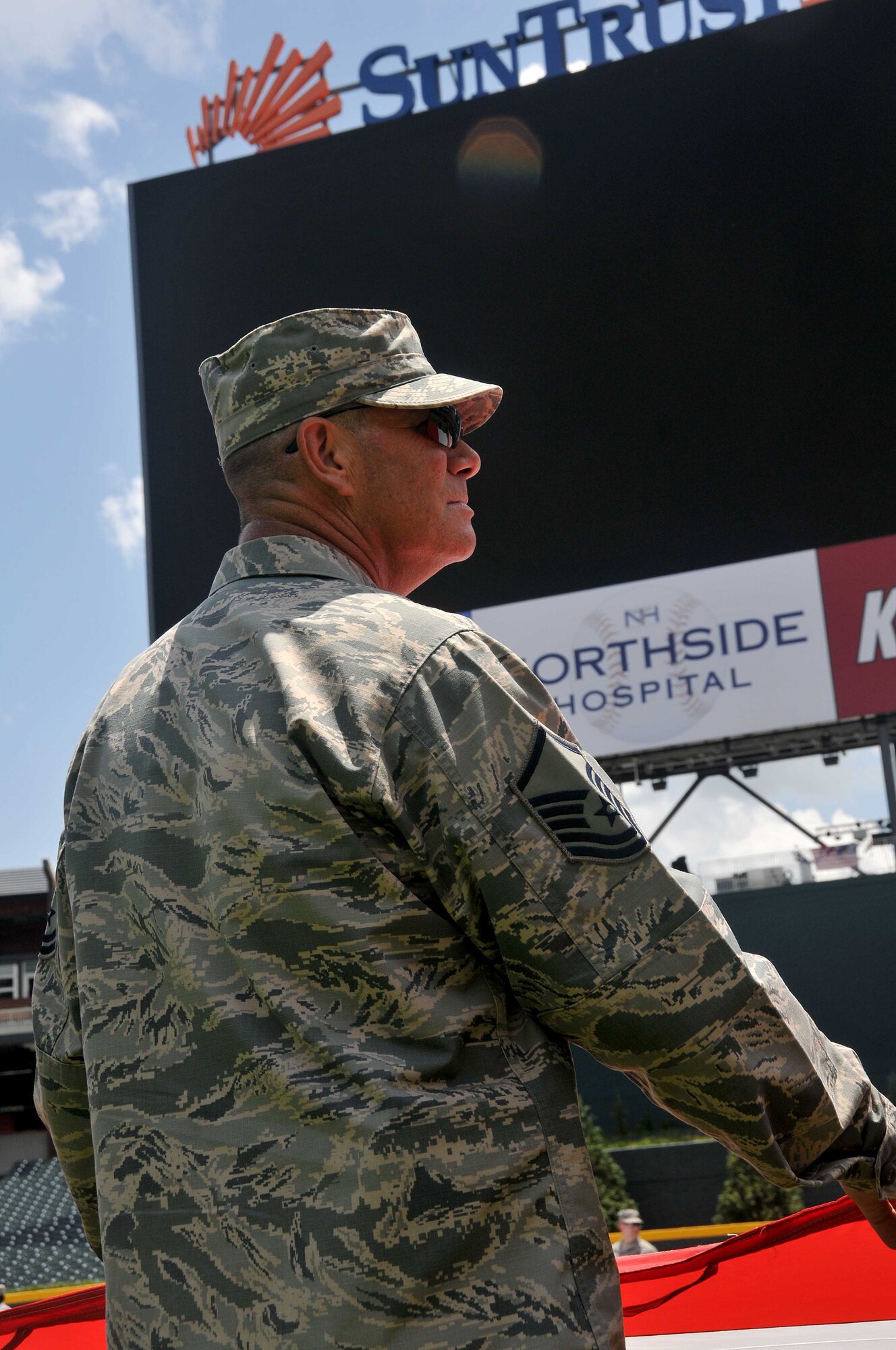 A group of about 80 men and women from the Army, Georgia National Guard, Air National Guard and Air Force Reserve practiced unfurling the American Flag. After a few practices, the team was released to tour the ball park and to later enjoy a buffet while the teams warmed up. At 8 p.m. the team participated in the opening ceremony at the Atlanta Braves game in SunTrust Park on July 4. (U.S. Air Force photo by Staff Sgt. Jaimi L. Upthegrove)