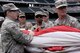 A group of about 80 men and women from the Army, Georgia National Guard, Air National Guard and Air Force Reserve practice unfurled the American Flag and carried it across the field to their specified location. After a few practices the team was released to take a tour and enjoy a buffet while the teams warmed up. At eight p.m. the team participated in the opening ceremony at SunTrust Park at the Atlanta Braves game on July 4, 2017. (U.S. Air Force photo by Staff Sgt. Jaimi L. Upthegrove)