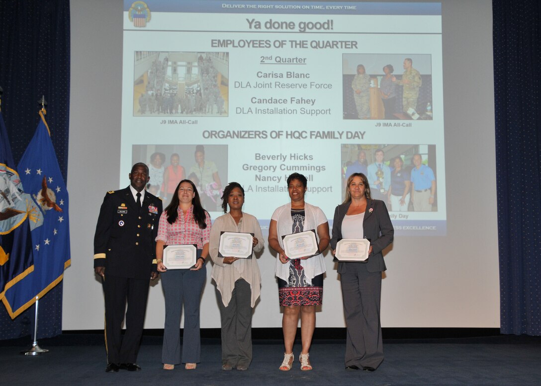 Army Lt. Gen. Darrell Williams poses with Employees of the Quarter Candace Fahey and Carisa Blanc, as well as their fellow "DLA Director’s ‘Ya Done Good’ Certificate of Achievement” winners Beverly Hicks and Nancy Howell (Gregory Cummings not pictured), at the July 6 Director’s Town Hall.