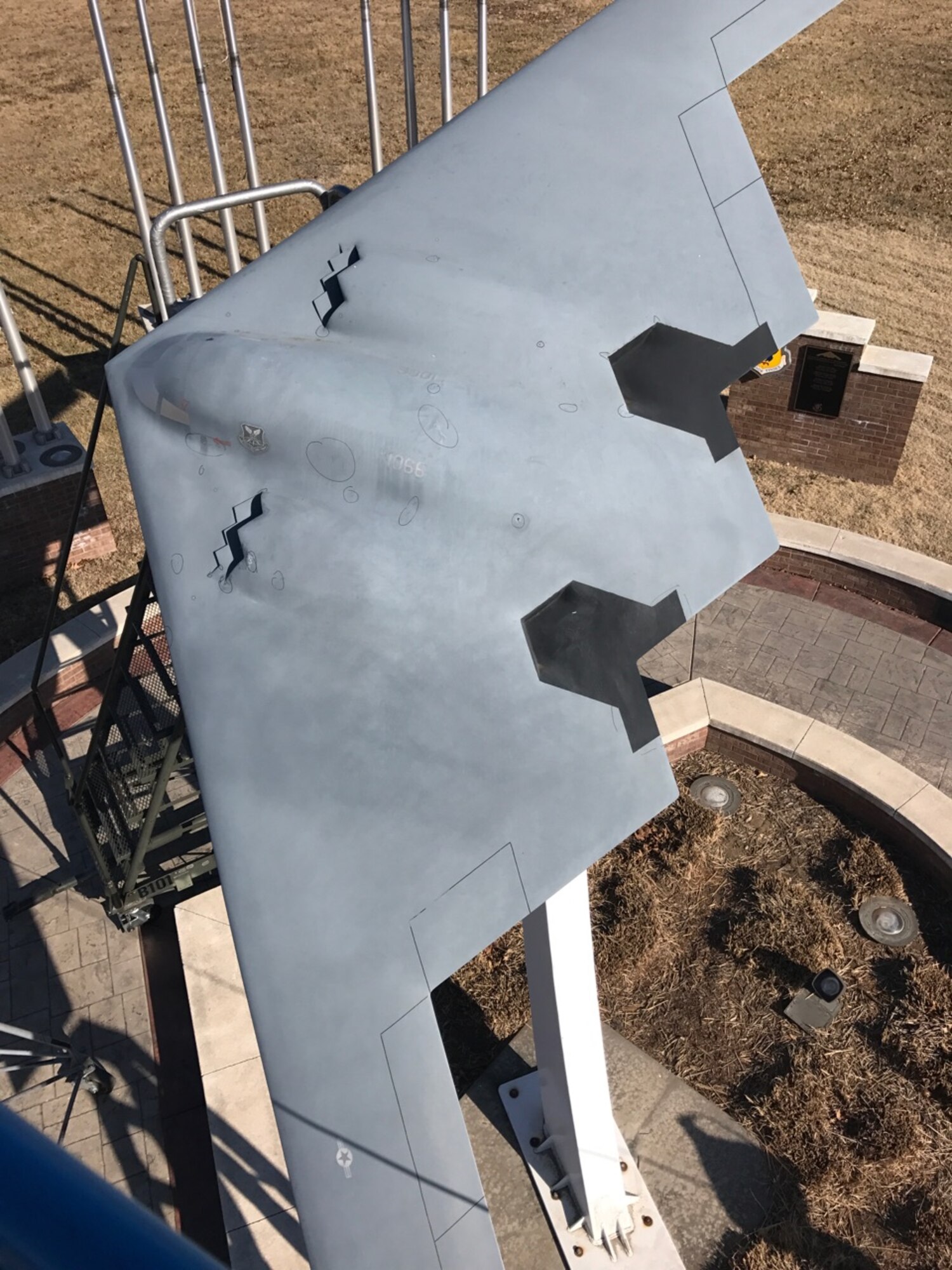 The mini B-2 static display before low observable maintainers from the 509th Maintenance Squadron used the vinyl-wrap technique to restore it at Whiteman Air Force Base, Mo. This technique is an environmentally friendly process that saved the Air Force $18,000. (Courtesy photo)