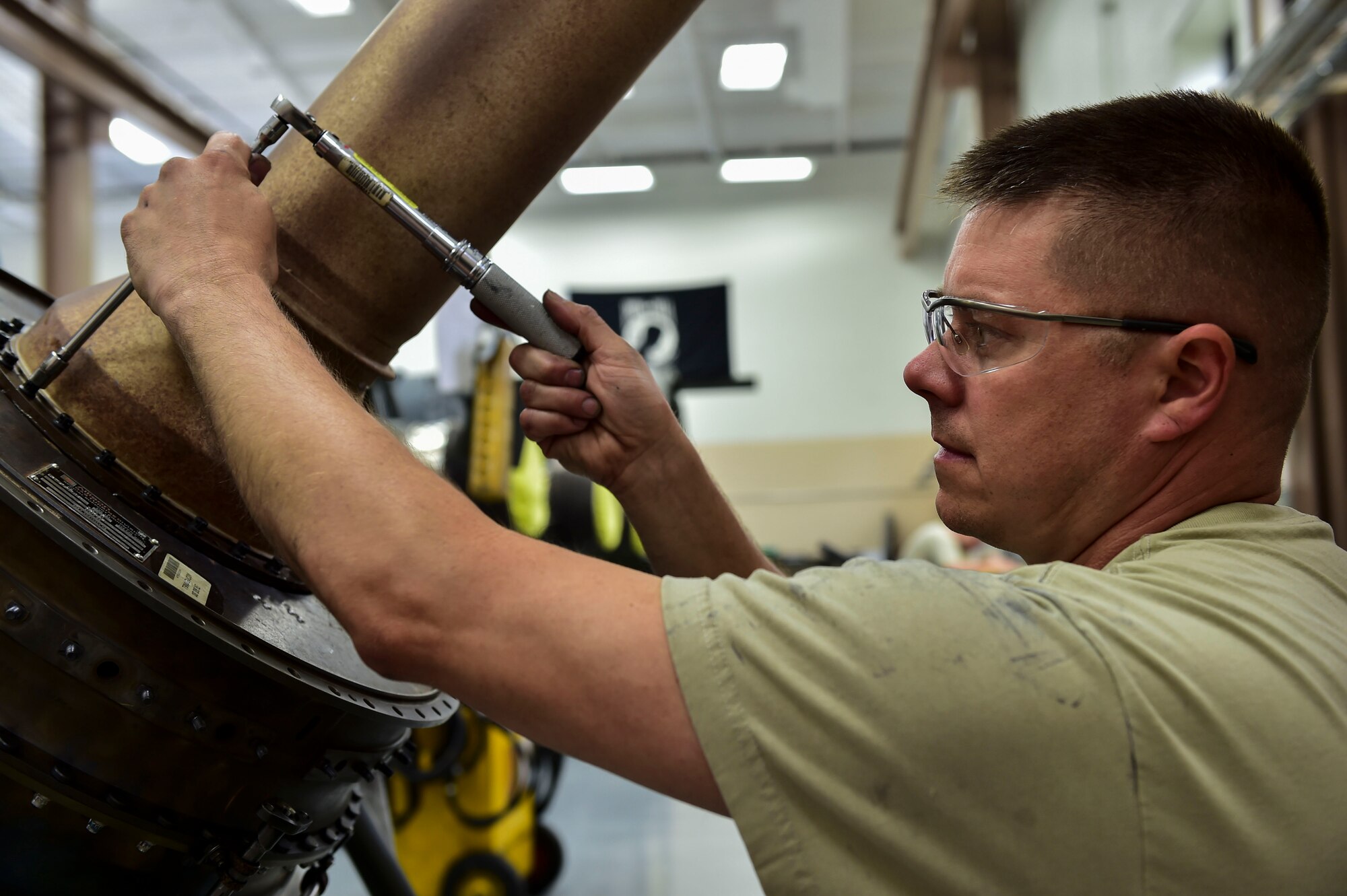 Tech. Sgt. Steve Lew, an aerospace propulsion craftsman with the 910th Maintenance Squadron here, rebuilds a C-130H Hercules aircraft engine turbine, July 6, 2017. Due to the extreme heat made by the turbine, components eventually wear down and are replaced when found during periodic inspections. (U.S. Air Force Photo/Senior Airman Jeffrey Grossi)