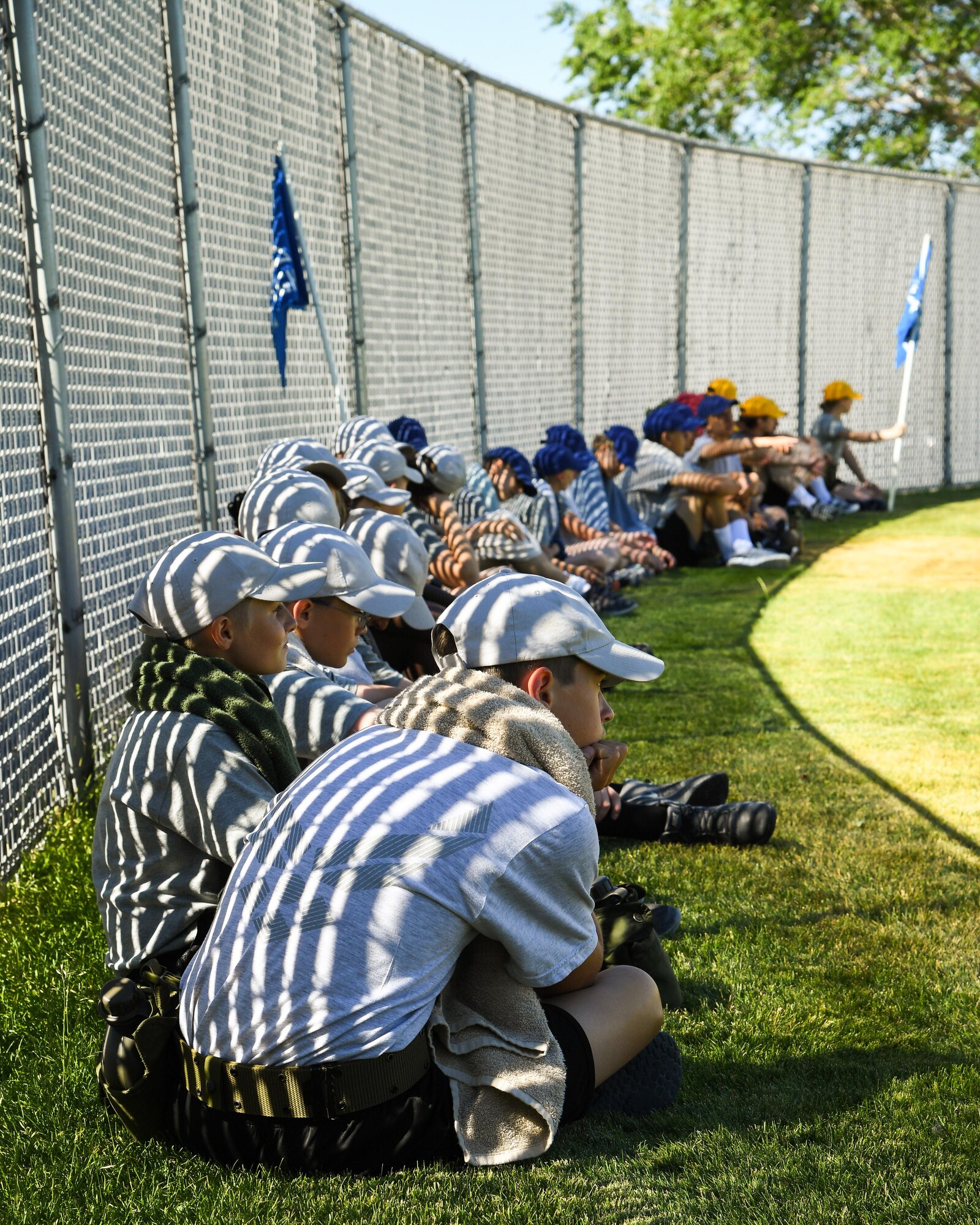 Civil Air Patrol Cadets take a break before a block of instruction and water confidence physical training during the Desert Hawk XV encampment, West Wendover municipal pool, West Wendover, Nevada, June 22, 2017. (U.S. Air Force photo/R. Nial Bradshaw)