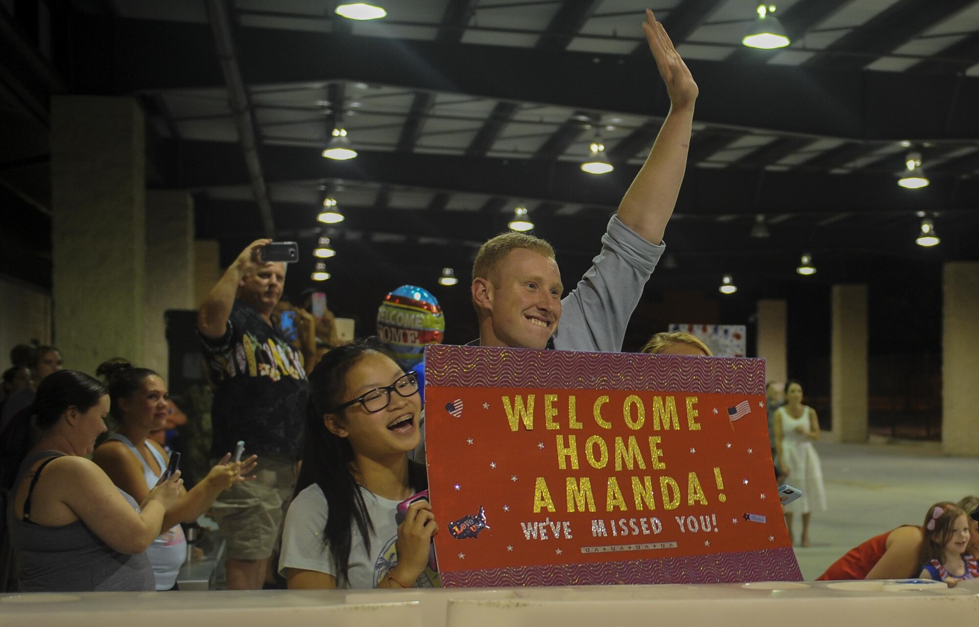 Families greet returning Air Commandos during Operation Homecoming at Hurlburt Field, Fla., July 5, 2017. Operation Homecoming welcomes home Air Commandos from overseas deployments. (U.S. Air Force photo by Airman 1st Class Isaac O. Guest IV)