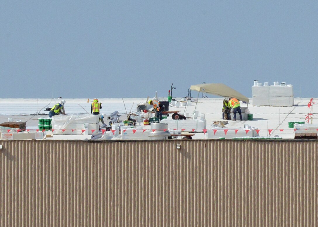 The 412th Civil Engineer Group is overseeing a roof upgrade for the Benefield Anechoic Facility. The project should last 45-50 days depending on heat and weather conditions. (U.S. Air Force photo by Kenji Thuloweit)