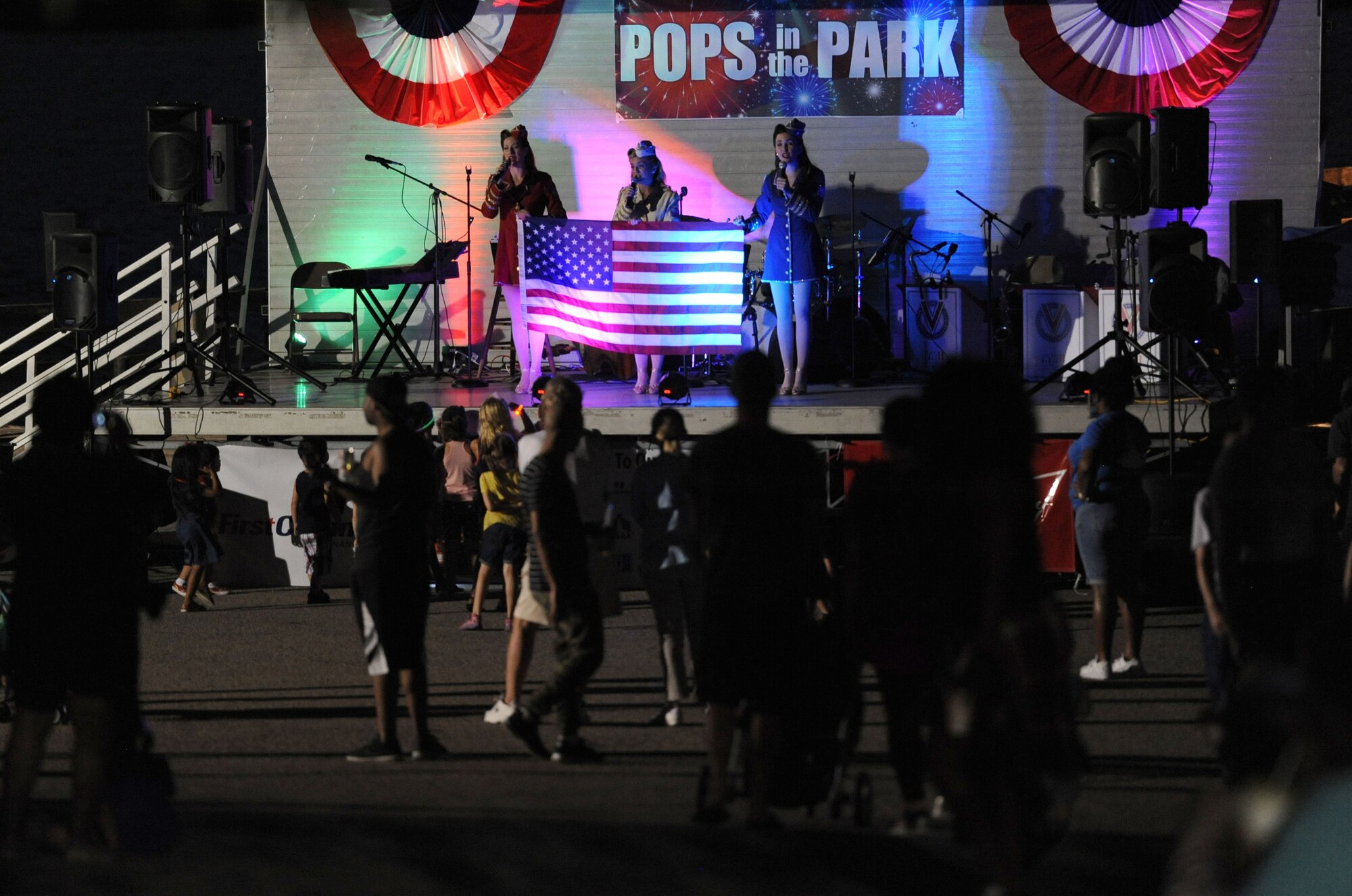The Victory Belles perform during the Pops in the Park event at Marina Park July 1, 2017, on Keesler Air Force Base, Miss. The event also included a kids’ fishing rodeo, mullet toss and fireworks display. (U.S. Air Force photo by Kemberly Groue)