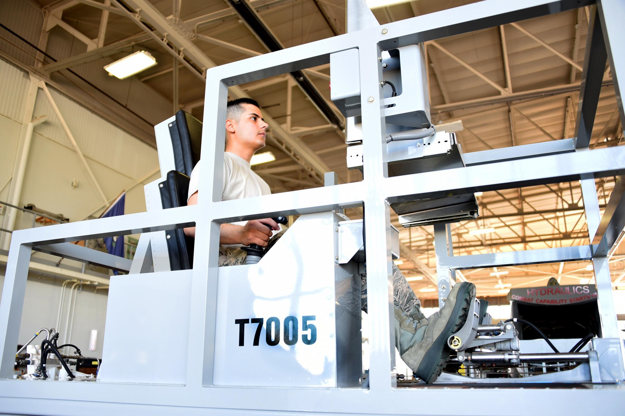 Airman Wyatt Johnson, 364th Training Squadron aircraft hydraulics apprentice operates the flight control trainer at Sheppard Air Force Base, Texas. This course is nine weeks long, with a total of eight blocks. (U.S. Air Force photo/Liz H. Colunga)