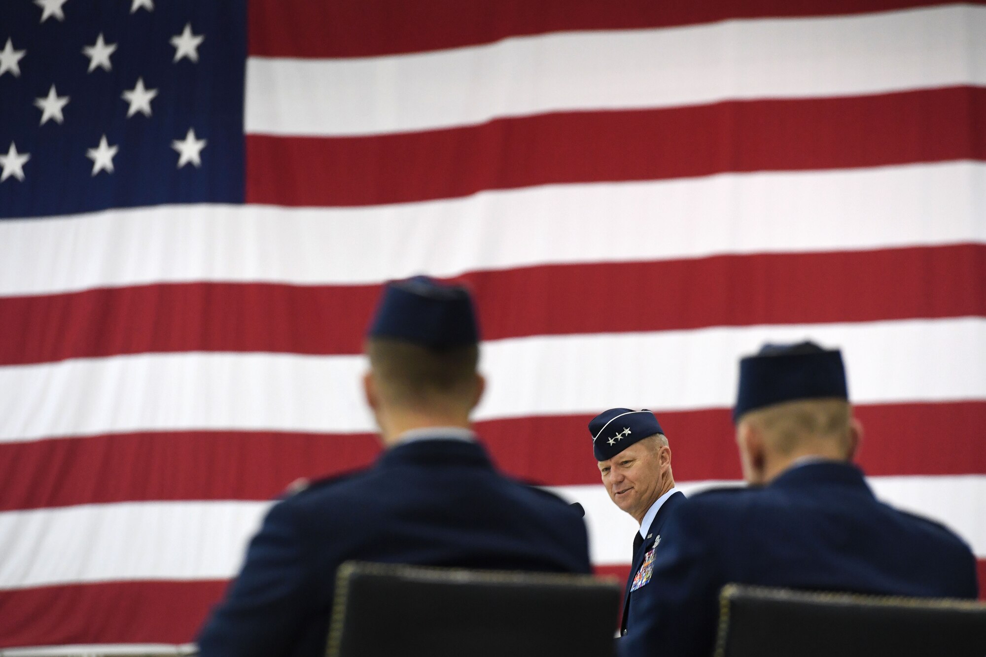 Lt. Gen. Mark Kelly, 12th Air Force commander, presides over the 432nd Wing change of command ceremony July 6, 2017, at Creech Air Force Base, Nev. During the event, the general bid farewell to Col. Case Cunningham while welcoming Col. Julian Cheater. (U.S. Air Force photo/Airman 1st Class James Thompson)