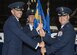 Col. E. John Teichert, left, 11th Wing and Joint Base Andrews commander, hands the 11th MSG guidon to Col. Bradley L. Johnson, 11th MSG commander, during a change of command ceremony at Joint Base Andrews, Md., July 6, 2017. Johnson replaced Col. William H. Kale III as 11th MSG commander. Johnson will preside over 1,500 personnel providing civil engineer, contracting, force support and logistics capabilities to 16,000 personnel throughout the National Capital Region. (U.S. Air Force photo by Senior Airman Jordyn Fetter)