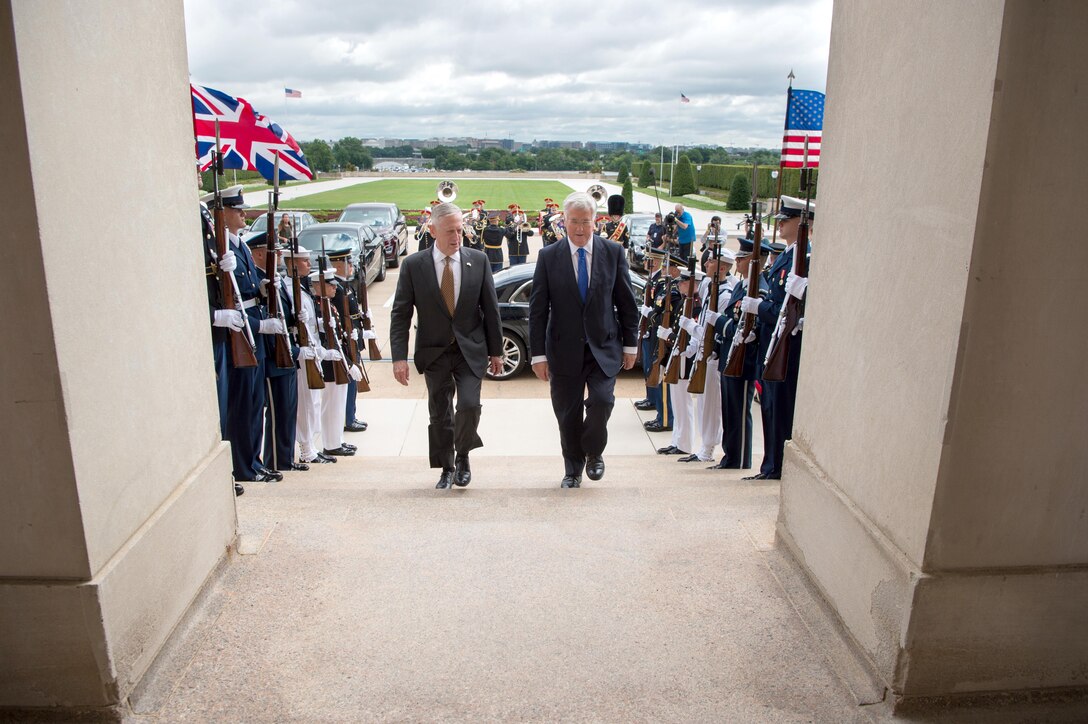 Defense Secretary Jim Mattis walks with the British Secretary of Defense Michael Fallon before a meeting at the Pentagon in Washington, D.C., July 7, 2017. DoD photo by Army Sgt. Amber I. Smith