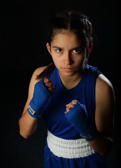 Gracy Kennedy poses for a photo at Minot Air Force Base, N.D., July 5, 2017. Kennedy recently won a national boxing championship for her age and weight bracket. (U.S. Air Force photo/Senior Airman Apryl Hall)
