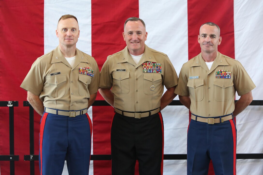 The outgoing commanding officer, Col. Jason L. Morris, and incoming commanding officer, Col. David M. Fallon, pose for a photo with the Western Recruiting Region commanding general, Brig. Gen. William Jurney, during the 9MCD Change of Command ceremony aboard Naval Station Great Lakes, Ill., on July 7, 2017. (U.S. Marine Corps photo by Sgt. Jennifer Webster/Released)