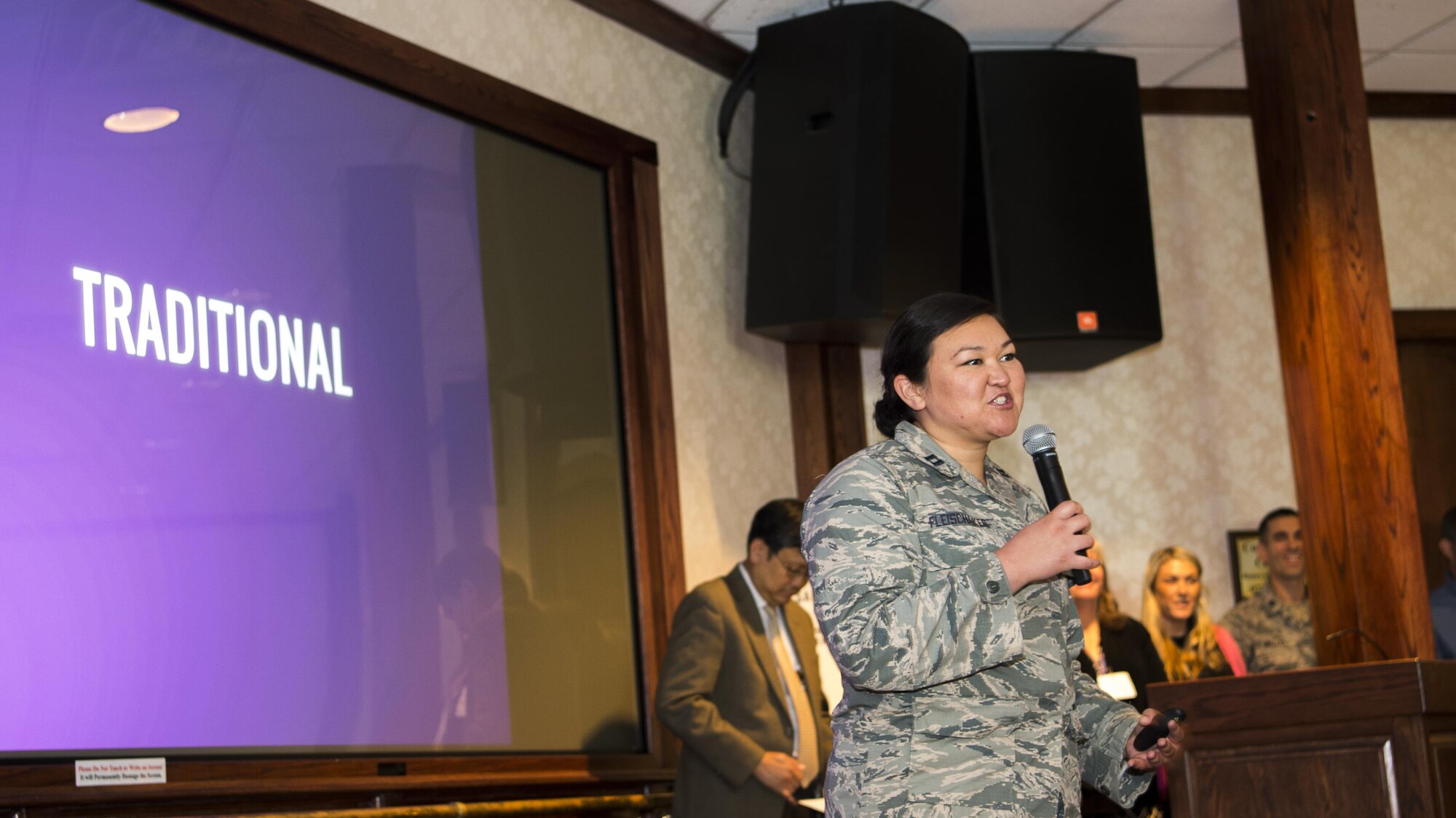 Capt. Evangeline Fleischaker, Early Warning System program lead from Peterson Air Force Base, Colo., briefs a traditional acquisition approach during the Secretary of the Air Force Office of Transformational Innovation’s pilot acquisition wargame June 30, 2017, at Hanscom Air Force Base, Mass. Fleischaker’s team was challenged to find a solution for a malware vulnerability that could, in the premise of the wargame, disable nearly a million desktop, laptop and mobile devices during a wargame held June 26-30. (U.S. Air Force photo by Benjamin Newell)