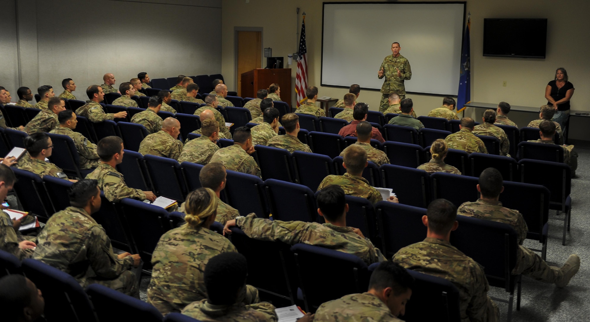 Air Commandos returning from deployment receive a reintegration briefing at the deployment control center, Hurlburt Field, Fla., July 6, 2017. Reintegration briefings ensure Air Commandos are aware of the various resources available to them when they come return home. The chapel, Military Family Life Counselor, Preservation of the Force and Family, financial, and medical services help Airmen remain resilient and ready to execute operations on the home front after deployments. (U.S. Air Force photo by Airman 1st Class Isaac O. Guest IV)